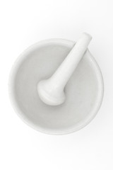 White mortar and pestle over white background