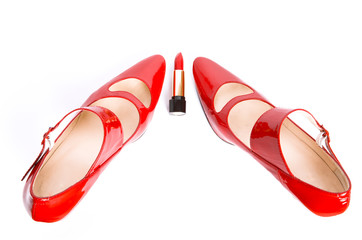 Shoes on a high heel and lipstick