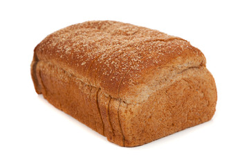 a loaf of sliced wheat bread on white