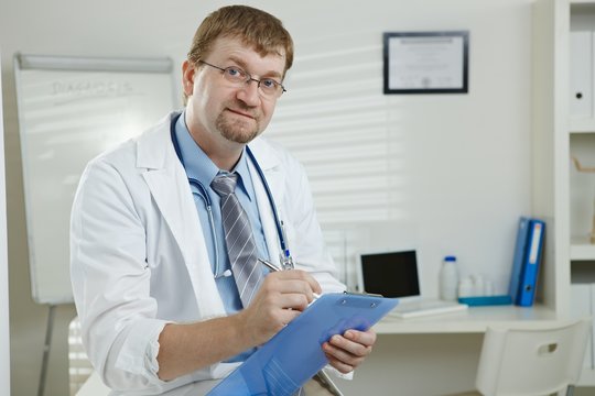 Male doctor in office