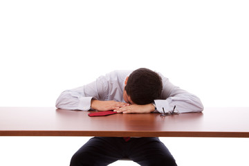 Obraz premium Businessman sleeping at the office