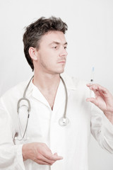 Young male doctor with stethoscope