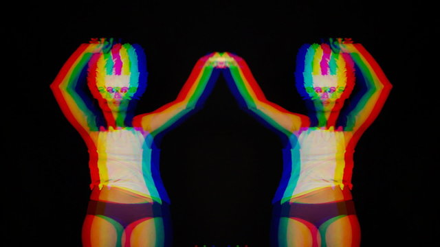 beautiful young masked woman dances to the groove