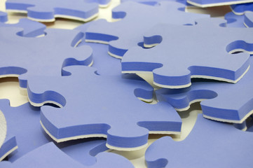 The combined parts of a blue puzzle