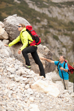 female hiker on rocky terrain