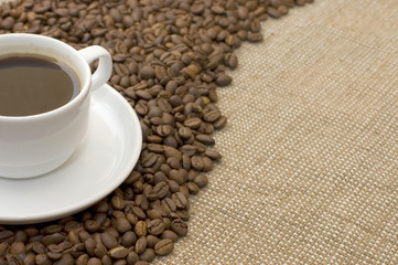 Cup from coffee on coffee grains