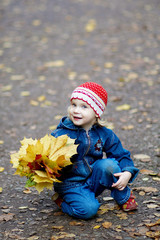 The girl with yellow leaves