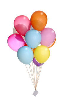 groupe de ballons colorés flottant dans l'air