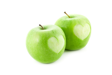 apples with heart isolated on white