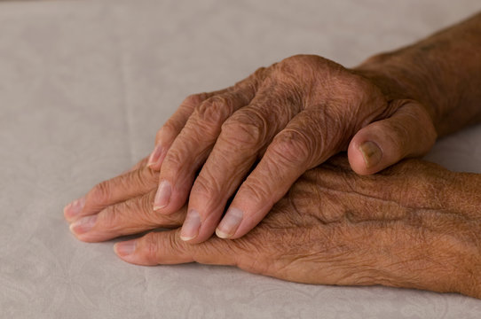 folded elders hands