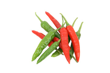 Green and red chillis on white background - a top view