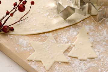 Cutting out Christmas biscuits.