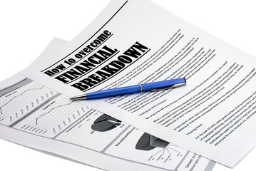 pen upon newspaprer article about crisis