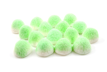 green sugar candy sweets over white background
