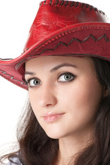 portrait  beautiful woman in a cowboy hat.