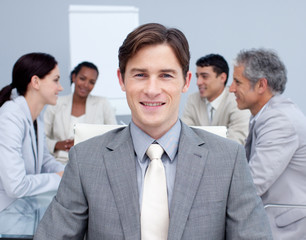 Obraz premium Close-up of a smiling young businessman in a meeting