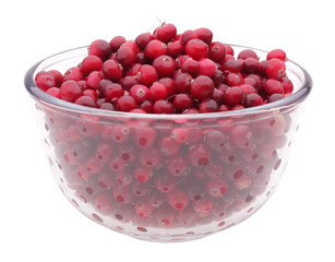 cranberries in glass cup isolated on white