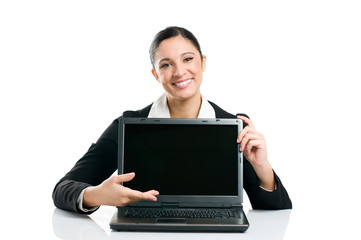 Business woman showing laptop screen