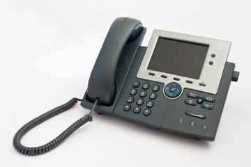 Modern VOIP telephone on white