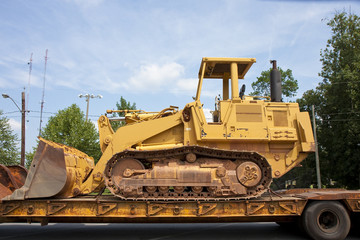 Bulldozer on a Truck