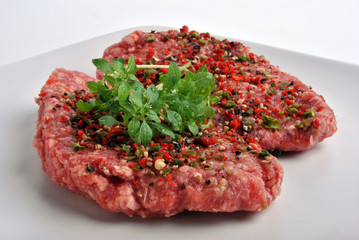 fresh peppered lamb grill steak on a white plate