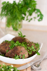 Scotch eggs on the plate in the kitchen