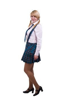 Senior high schoolgirl in uniform is posing