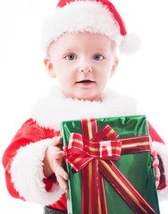 Beautiful toddler Santa with Christmas gift