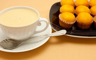 Closeup of coffee with milk in white cup