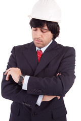 Young Engineer consulting his watch