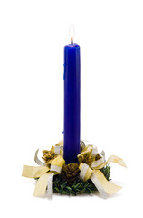 Decorated blue candle on white