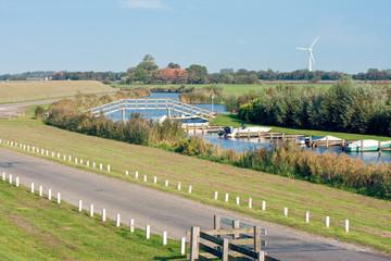 Typical Dutch rural landscape with farmland and watercourses