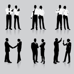 Young business people silhouettes