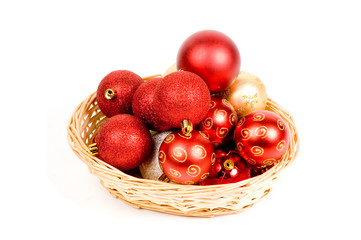 basket filled with red and golden christmas balls