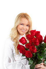 beautiful young girl with a bouquet of roses