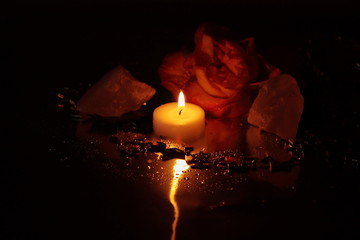 candle and roses