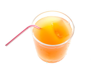 glass of orange juice with ice