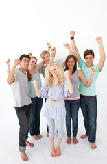Obraz premium Successful friends standing against white background
