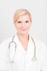 Young female doctor with medical stethoscope