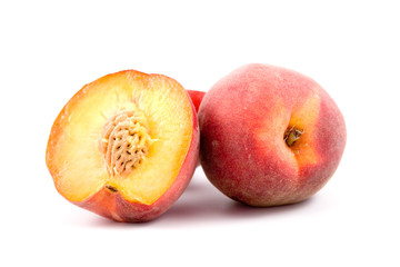 Ripe peaches isolated on a white background
