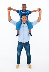 Dad giving son piggyback ride