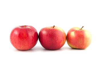 Three red apples