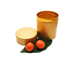 Golden bank with orange sweets