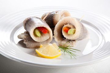 Marinated herring fillets with vegetables