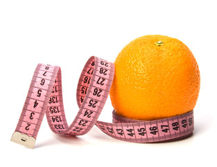 tape measure wrapped around the orange isolated on white backgr