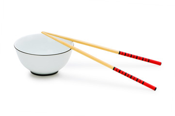 Fototapeta na wymiar Bowl and chopsticks isolated on the white