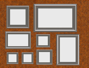 Brick wall display with collection of frames