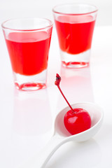 cherry in spoon