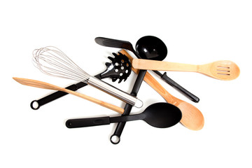 Assorted kitchen utensils on a white background