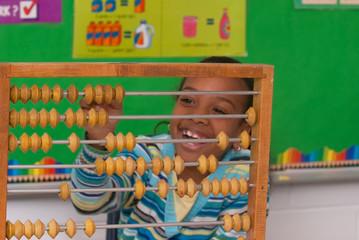 A child with a abacus